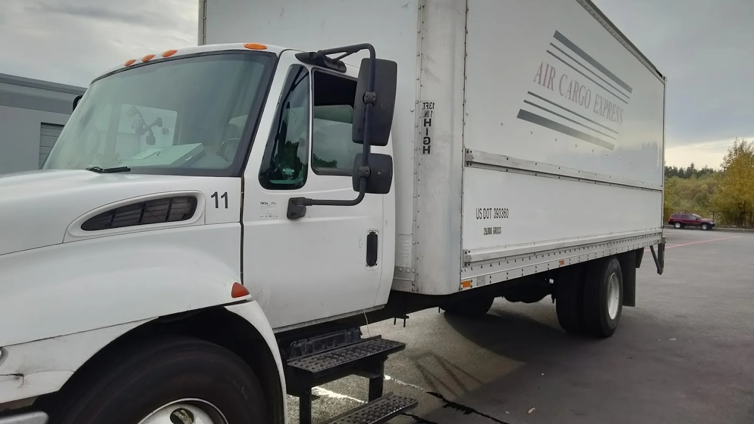 An Air Cargo Express box truck in the yard